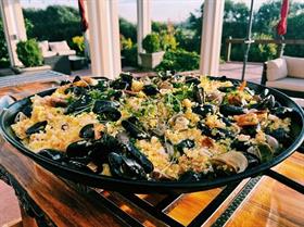 Paella Dinner with live performance featuring Spanish guitarist Gustavo Lopez at Walla Walla Valley Tasting Room Saturday August 16th, 2025